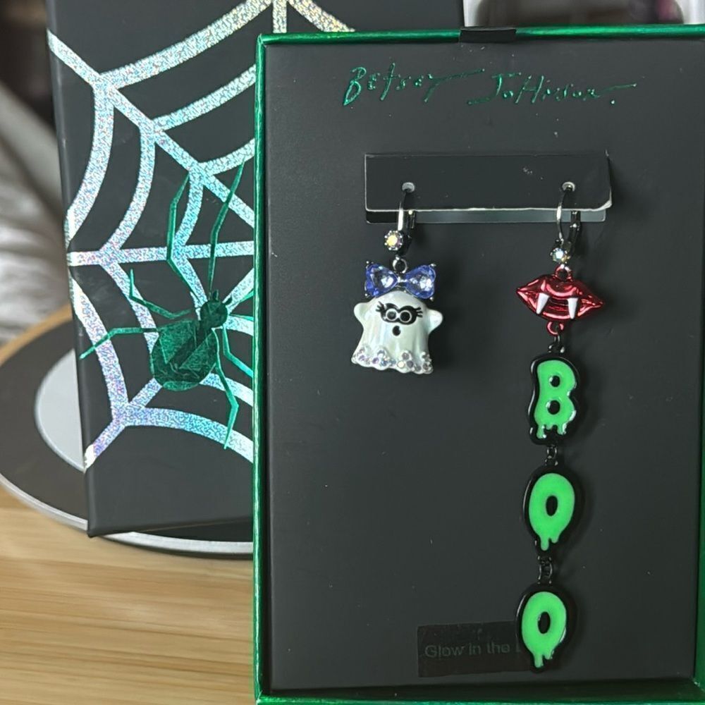 Betsy Johnson mismatched glow in the dark earrings they